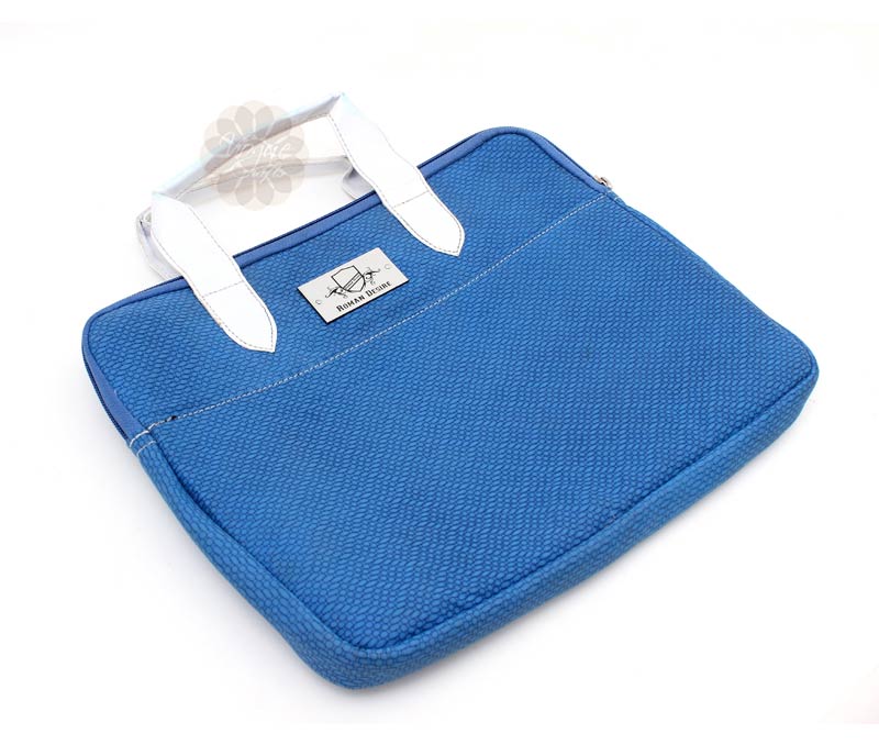 Vogue Crafts & Designs Pvt. Ltd. manufactures Blue Satchel Bag at wholesale price.